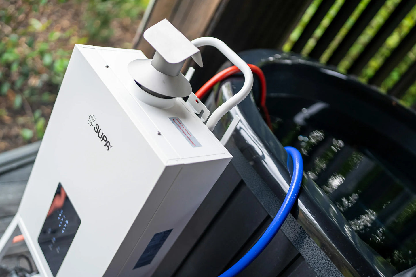 Supa water heater near hot tub